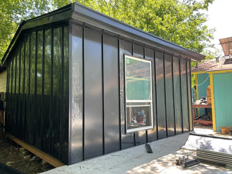 Black standing seam metal wall panels for Metal Roof Installation in Woodmoor