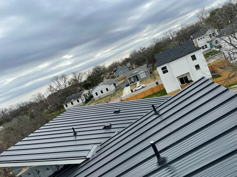 Standing seam metal roof panels with vents for Skylight Repair in Woodmoor